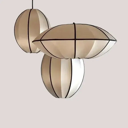 Zen Silk Pendant Light Mid Century Fabric Lantern showcasing a sculptural lantern form in soft satin silk fabric.