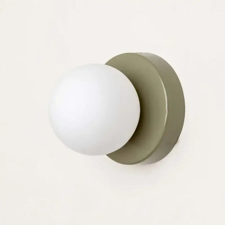 Colourful Macaron LED Wall Lamp 10/12cm - Frosted glass bulb on a modern green base, perfect for stylish hallways.
