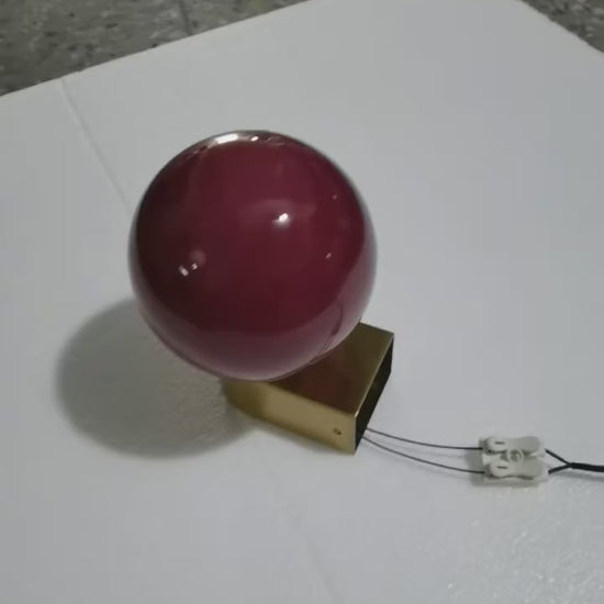 Chic Dual Bubble Wall Light - Modern & Versatile Lighting, featuring a polished brass frame and colored bubble for stylish interiors.