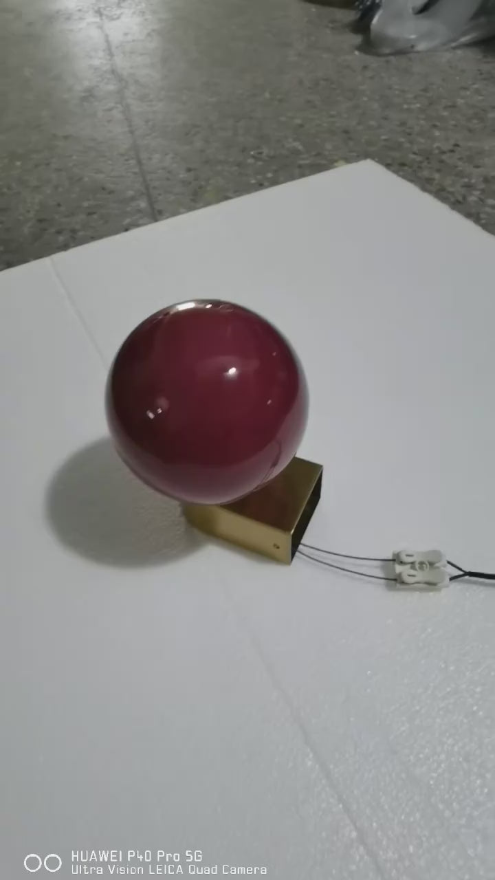 Chic Dual Bubble Wall Light - Modern & Versatile Lighting, featuring a polished brass frame and colored bubble for stylish interiors.