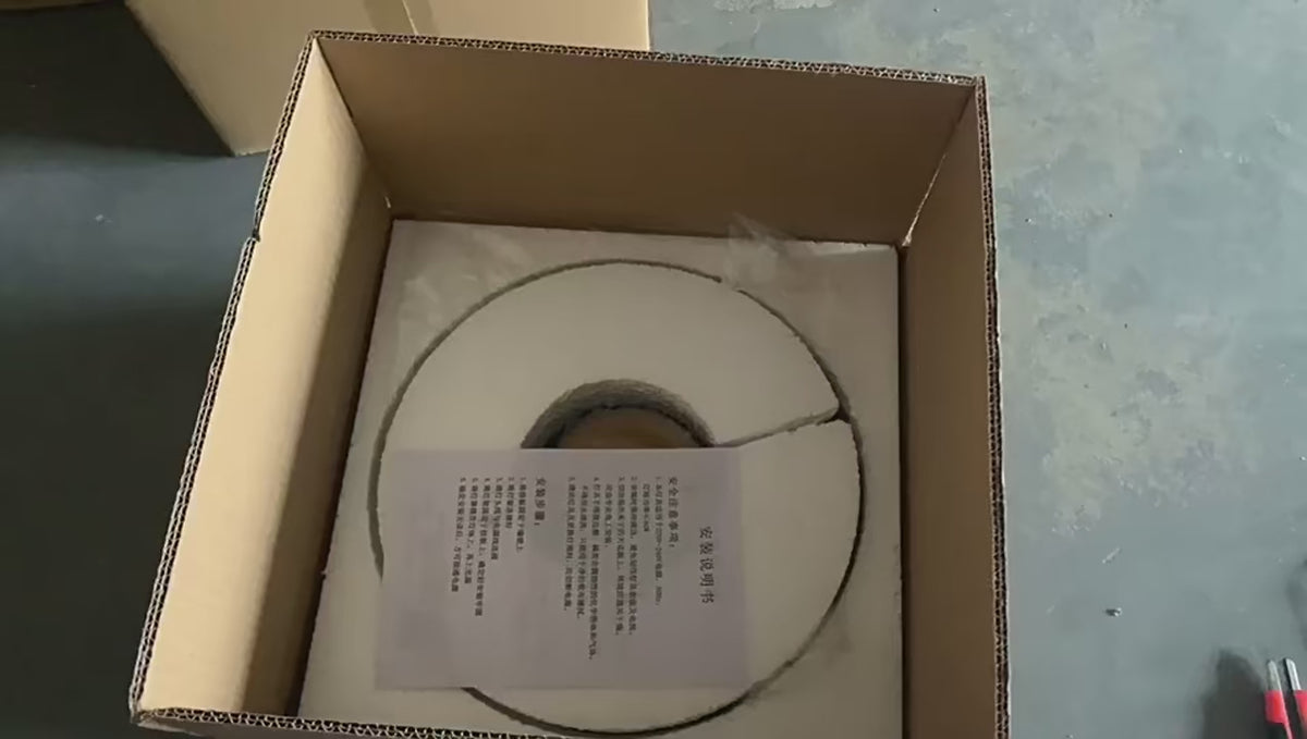 Colourful 30 cm Modern Circle Wall Light with Gold in packaging, showcasing the product inside a cardboard box.