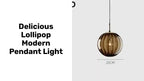 Delicious Lollipop Modern Pendant Light showcasing a unique design with a sleek finish and colorful glass balls.