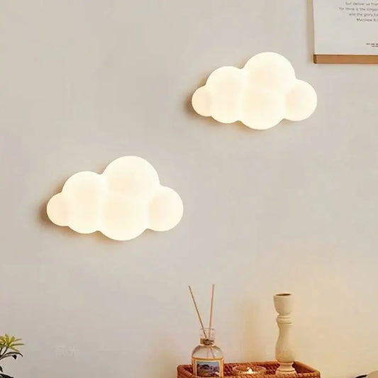Cordless cloud wall light nursery displayed on a wall, featuring soft glow and whimsical cloud design.